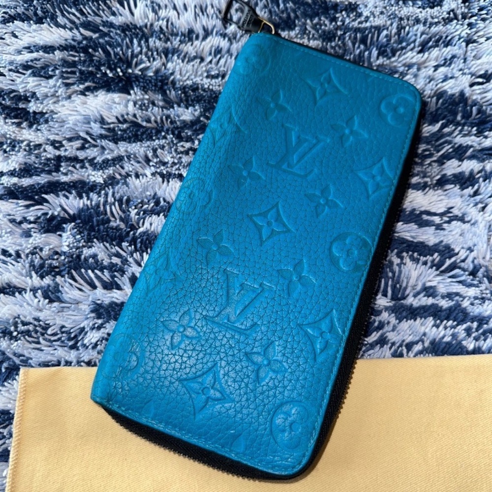 Louis Vuitton Taurillon Turquoise Vertical Zippy Wallet